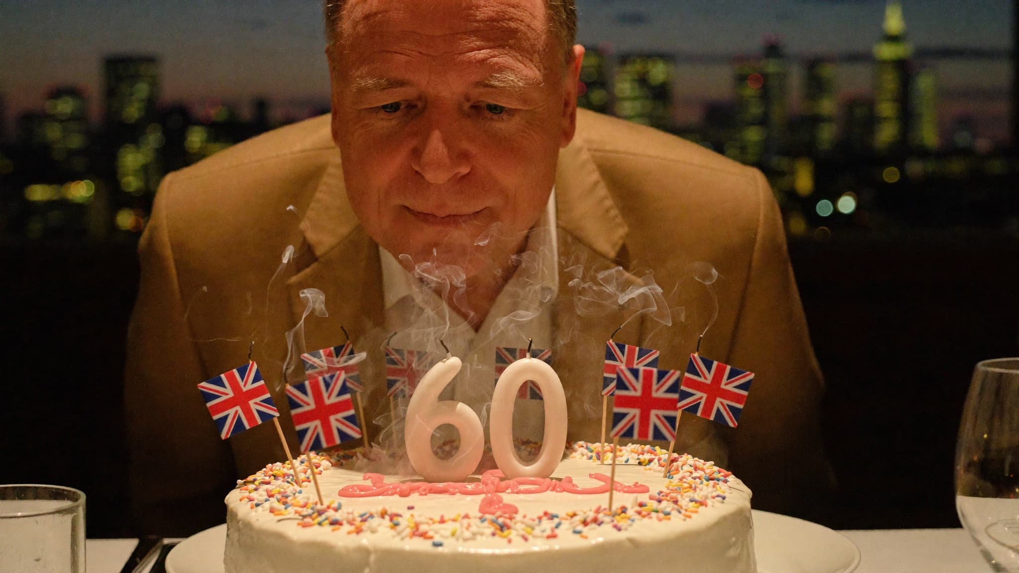 Sixty candles, one breath