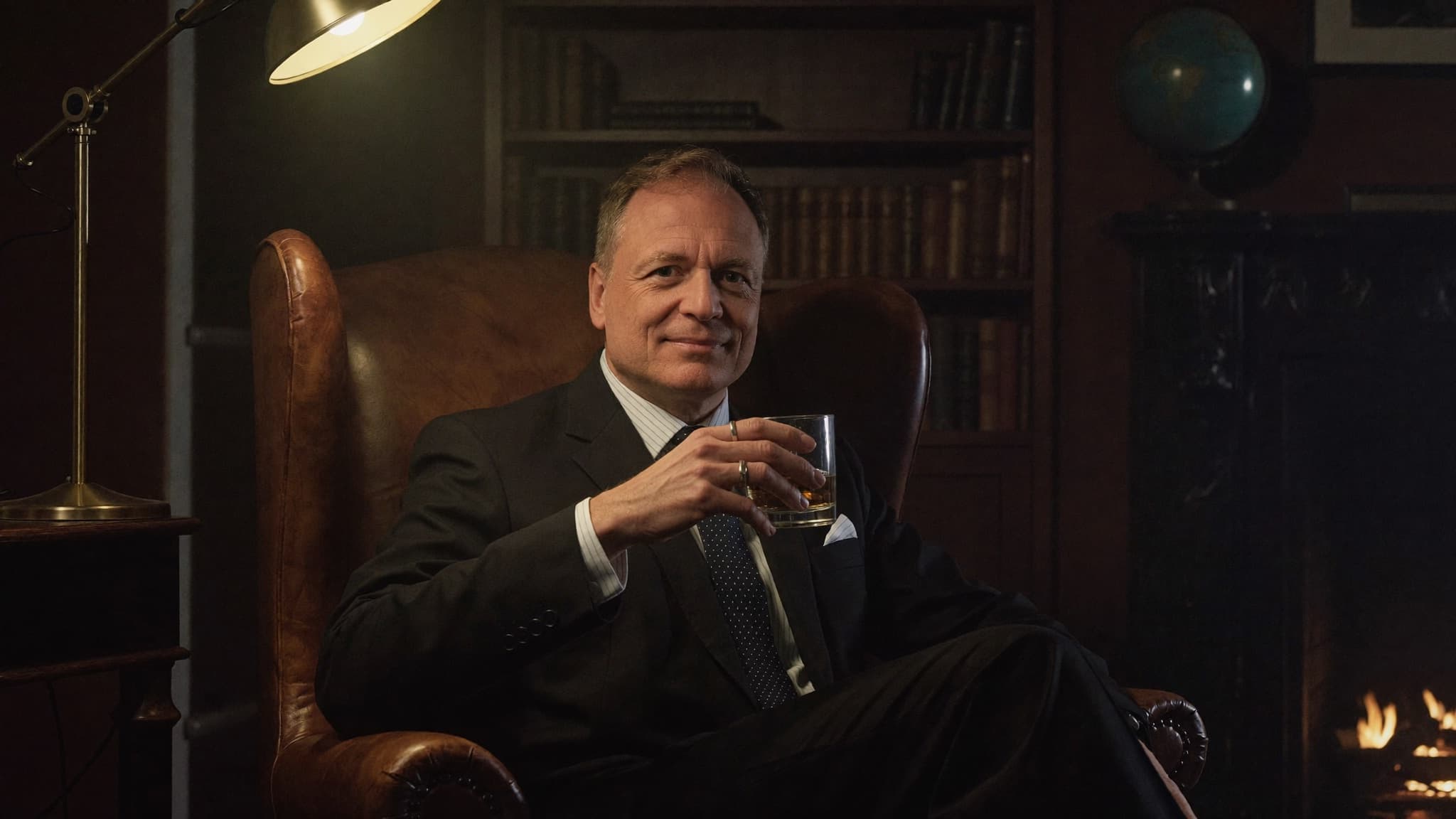 Whisky, fireplace, nodding