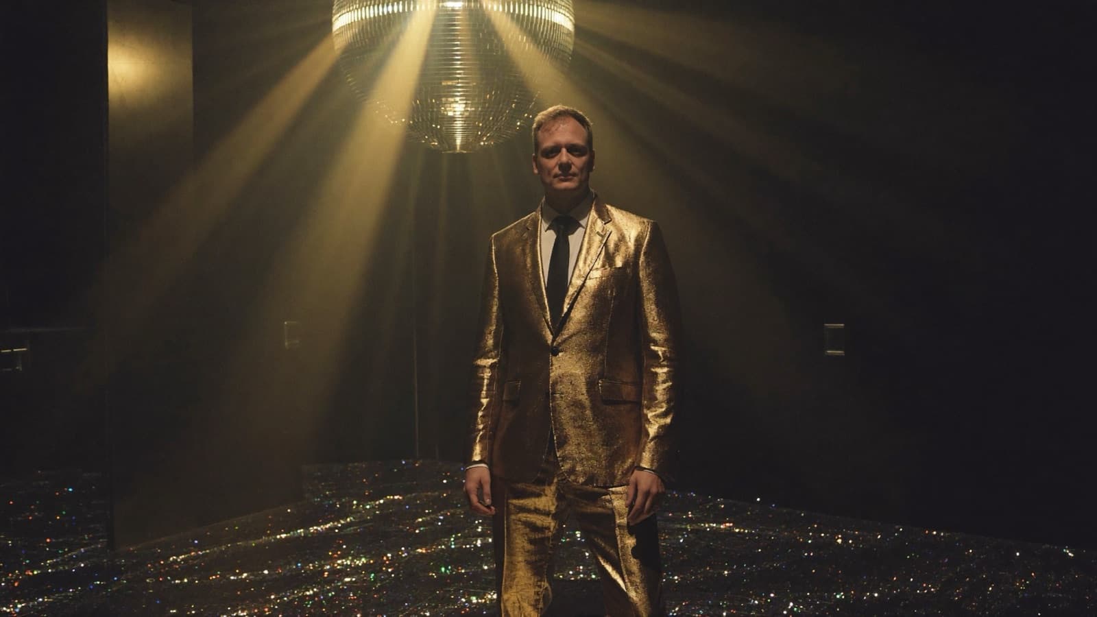 ABBA Voyage costume — Gold sequinned suit.